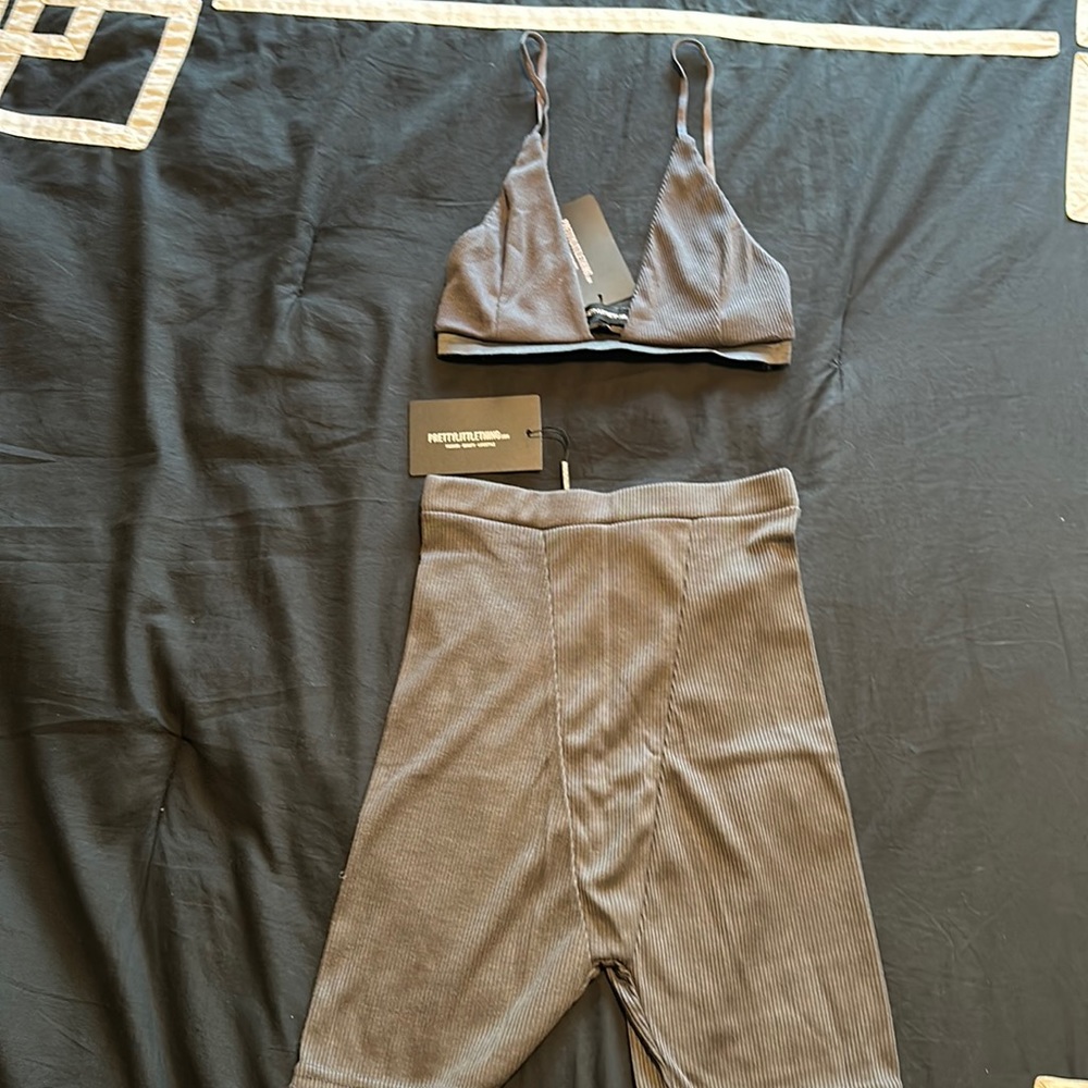 Pretty little thing charcoal grey bralette and short set. Size 6 NWT